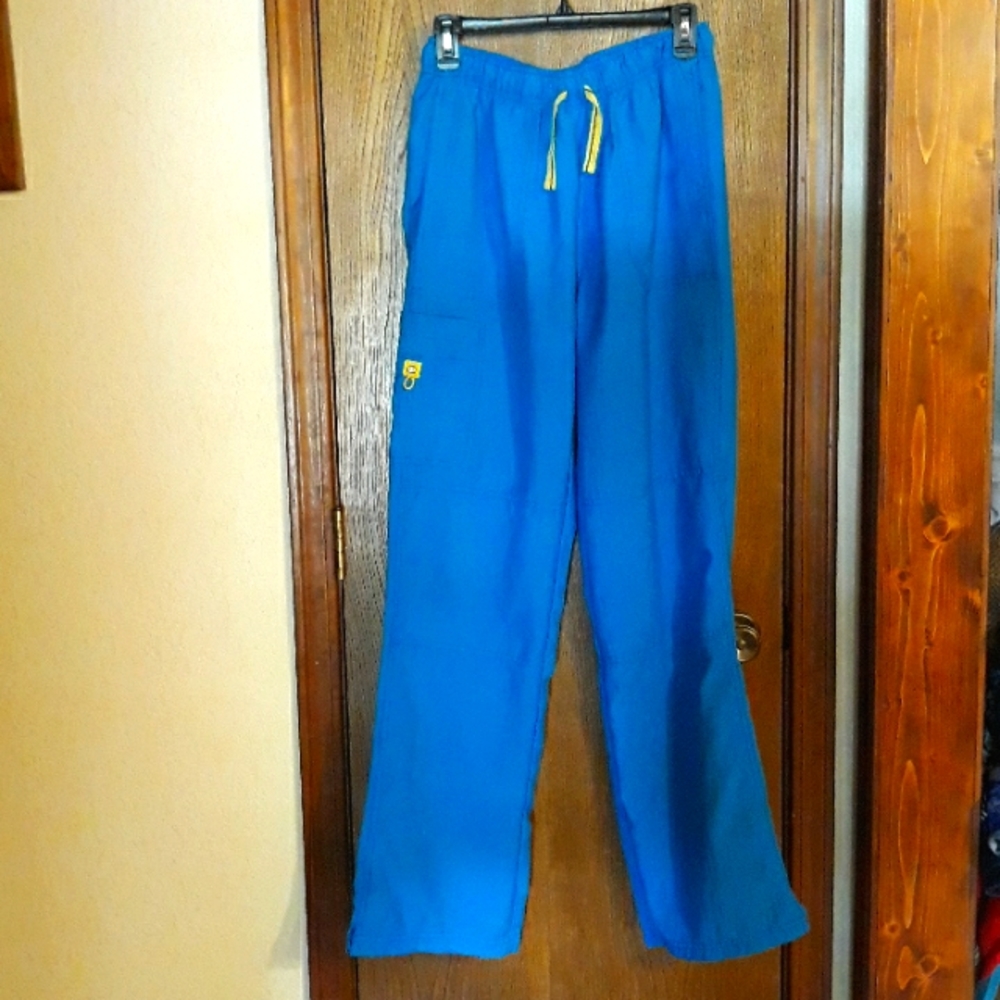 Spread good cheer scrub pants